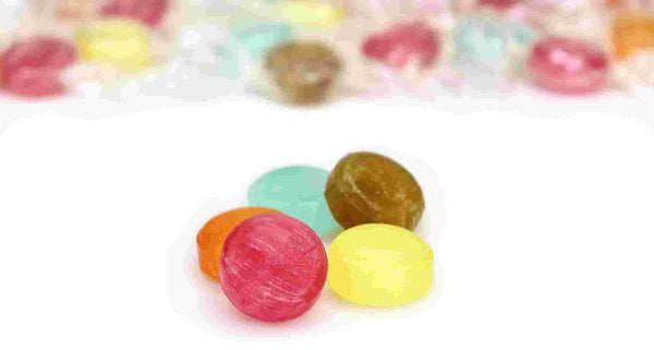 Colorful gummy candies on a white background