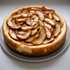 Andy Anand 9-inch sugar-free gluten-free apple cheesecake with cinnamon-spiced apple topping, baked fresh in California