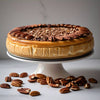 Whole Andy Anand gluten-free caramel pecan cheesecake with sugar-free caramel drizzle and toasted California pecans on top