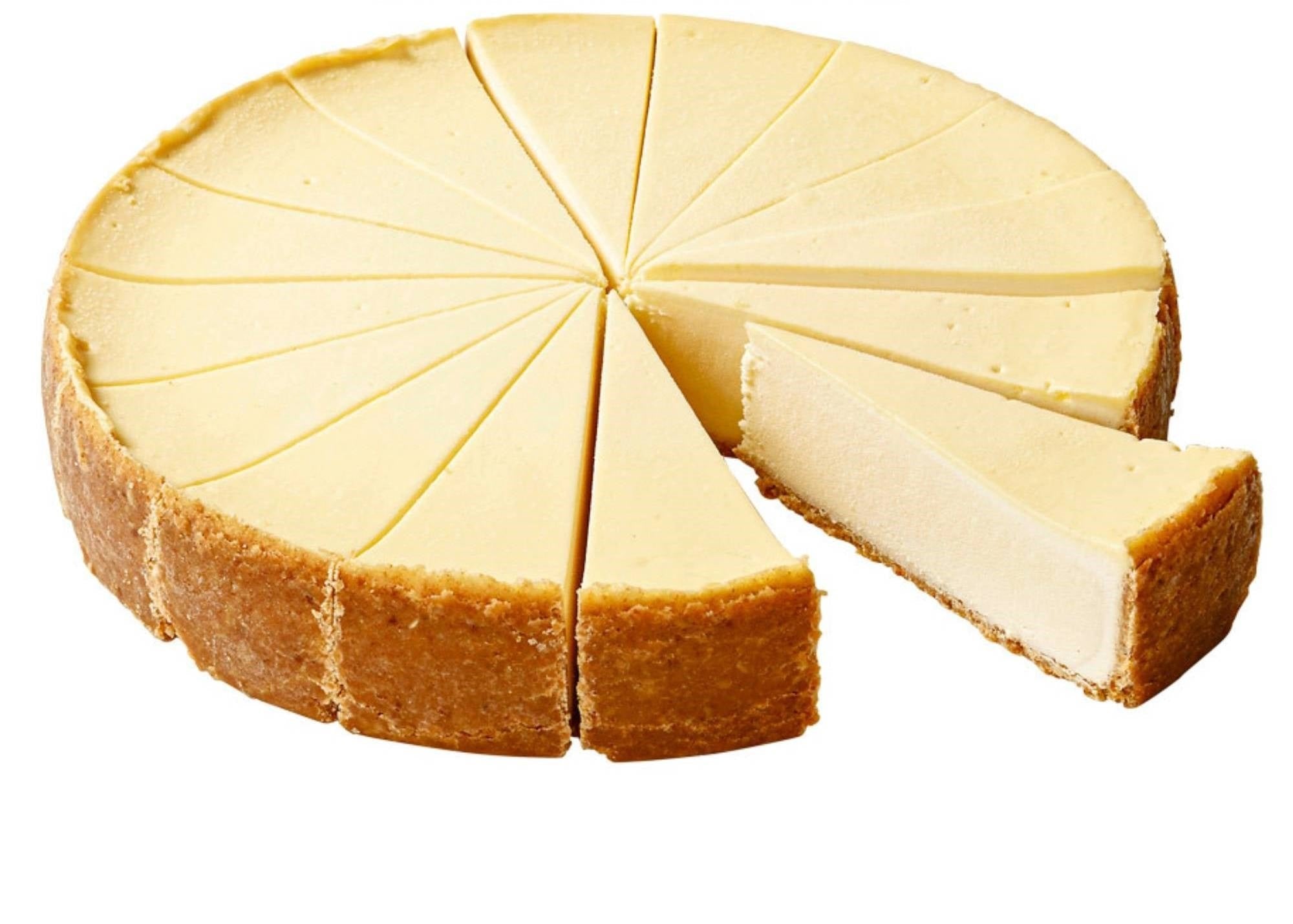 Cheesecake with a slice removed on a white background
