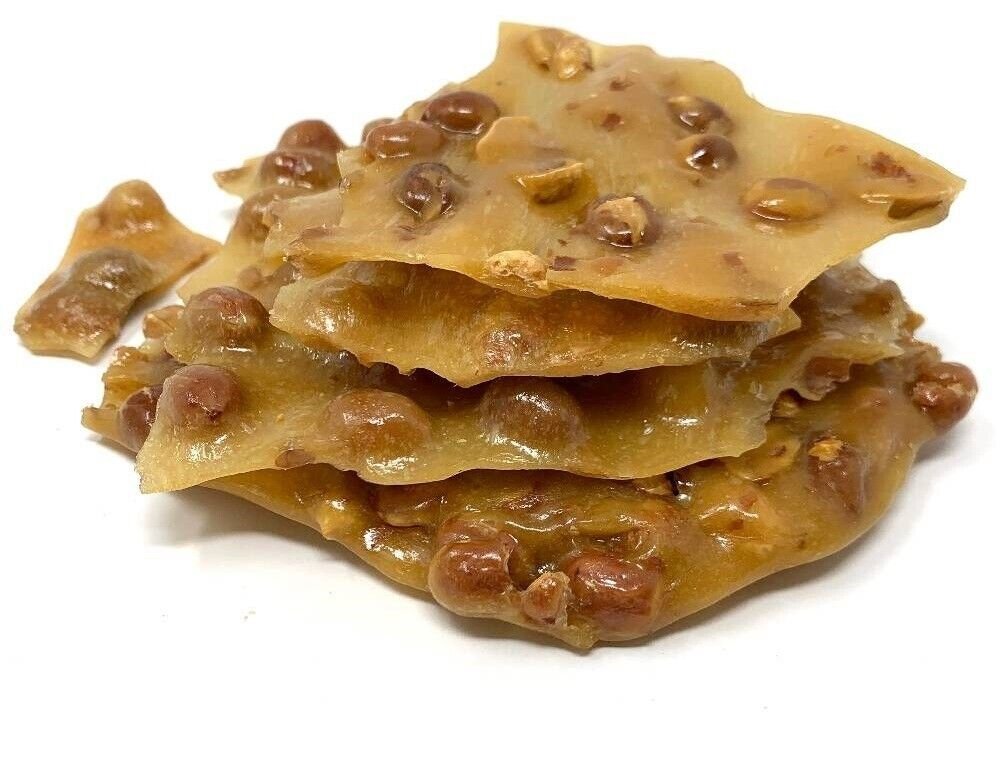 Stack of peanut brittle on a white background
