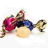 Colorful wrapped candies on a white background