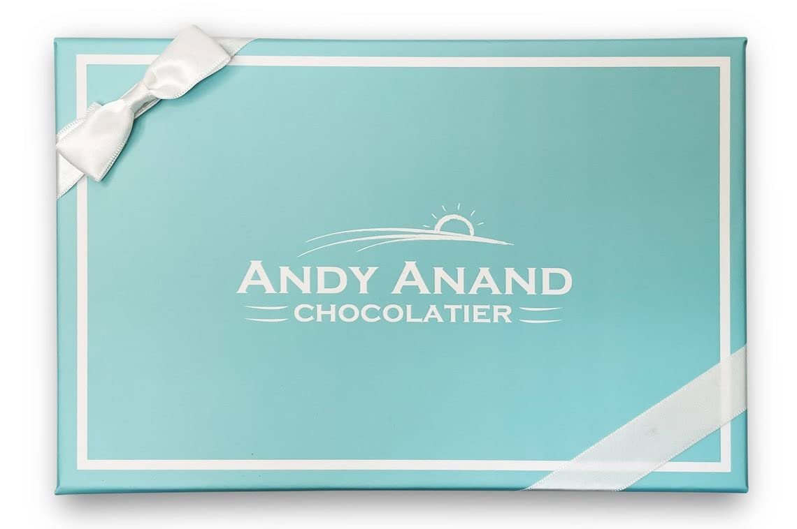 Tiffany blue box with white bow and 'Andy Anand Chocolatier' logo