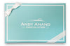 Tiffany blue box with white bow and 'Andy Anand Chocolatier' logo
