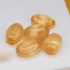 Close-up of Andy Anand sugar free ginger turmeric hard candy showing texture and colour