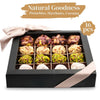 Andy Anand natural date truffle gift box open showing assorted pistachio, hazelnut, and coconut truffles