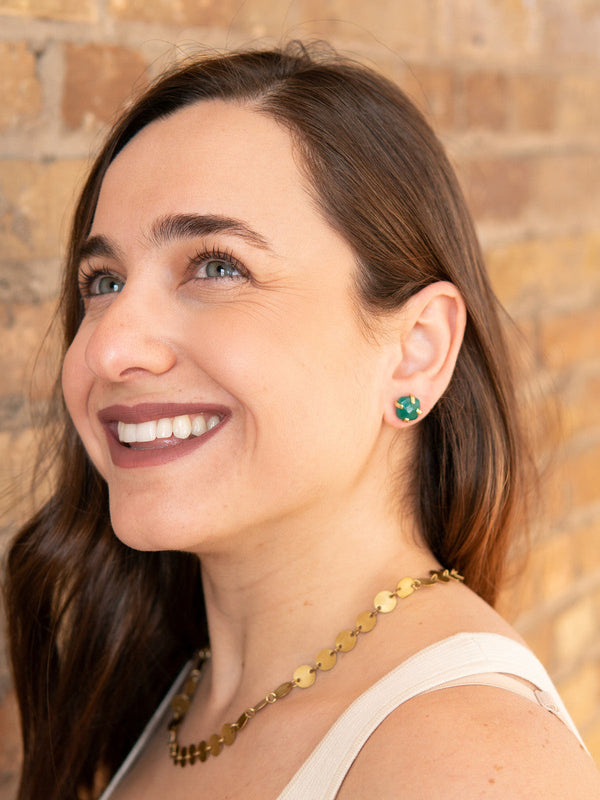 Green onyx encaged stud earrings styled on model, ethically made in India by Fair Anita