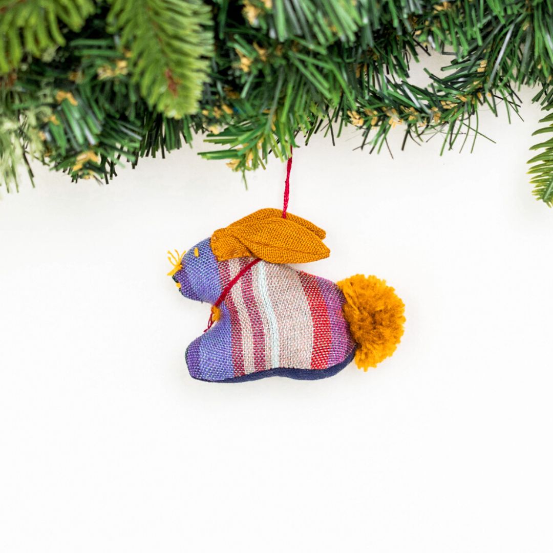 Add a touch of whimsy to your home with our adorable Animalitos. These handcrafted decorations are made from sustainable cotton and support fair trade practices.