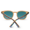 Sunglasses with wooden frame and blue-tinted lenses on a white background