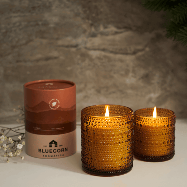 Close-up of Aromática non-toxic scented candle with natural cotton wick
