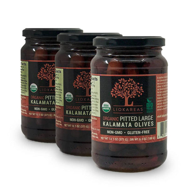 Liokareas organic Kalamata olives served in a bowl as part of a Mediterranean mezze spread