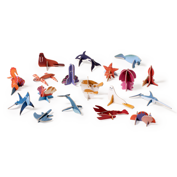 Set of colorful paper animal models on a white background