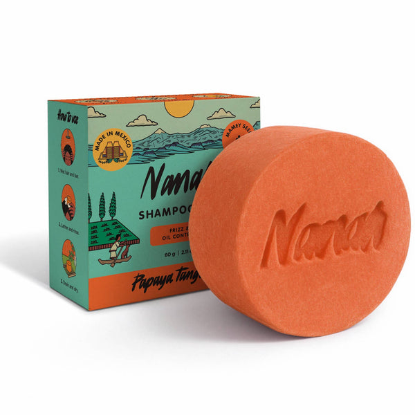 Orange shampoo bar with 'Namar' branding next to its packaging on a white background. NANAH Papaya Mandarin shampoo bar — sulfate-free, rebalances oily hair with papaya extract, mandarin oil & castor seed oil. Replaces 3 bottles. Perfect hair gift.