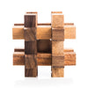 Wooden puzzle sculpture on a white background
