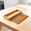 Bamboo Chopstick Storage Box, Large, shown holding chopsticks