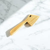 Bamboo Dough Scraper resting on a wooden kitchen counter