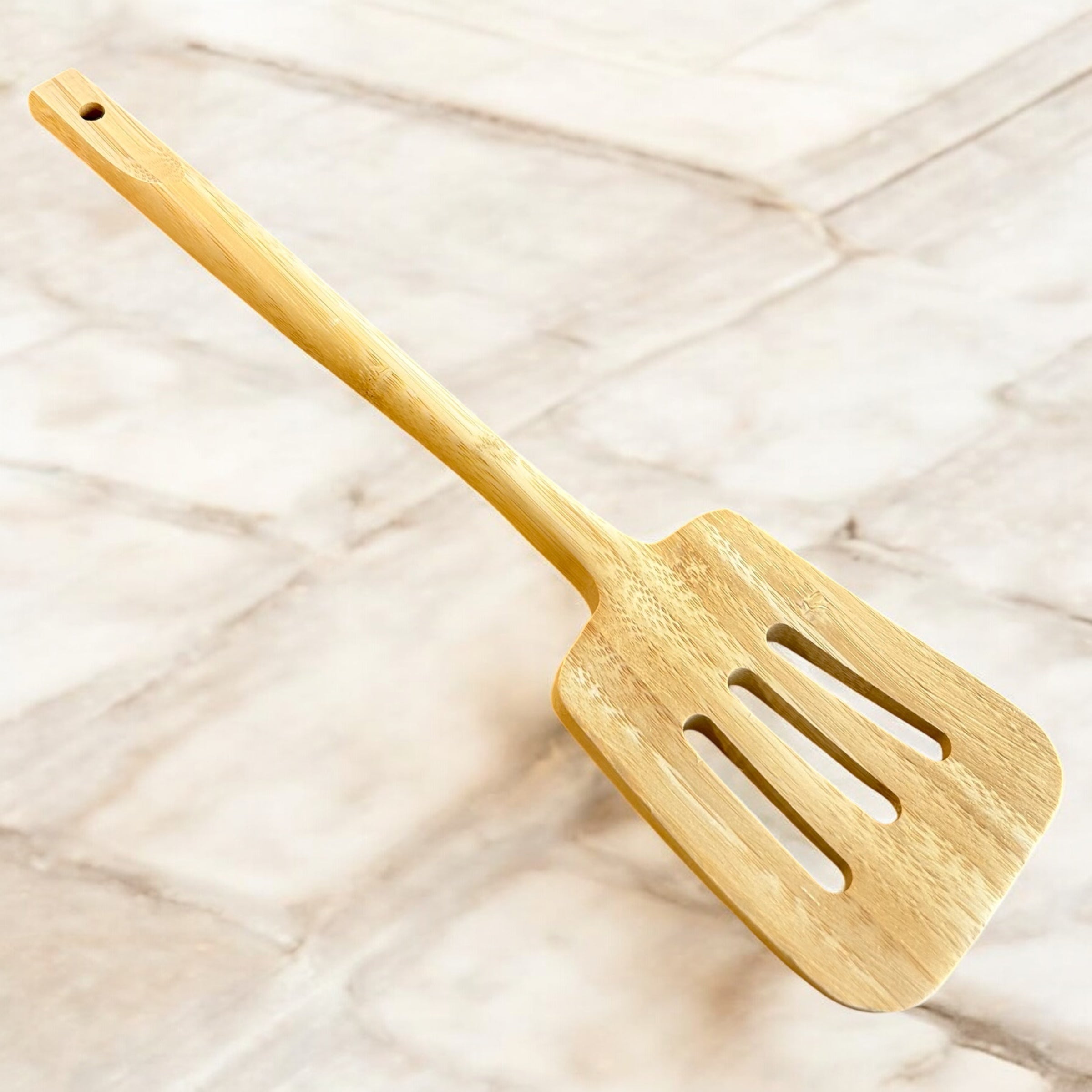 Bamboo Slotted Spatula shown with natural wood grain detail