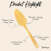 Bamboo Serving Spatula placed beside kitchen cookware
