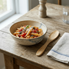 Close-up view of the Bamboo Serving Utensil Spoon's natural finish