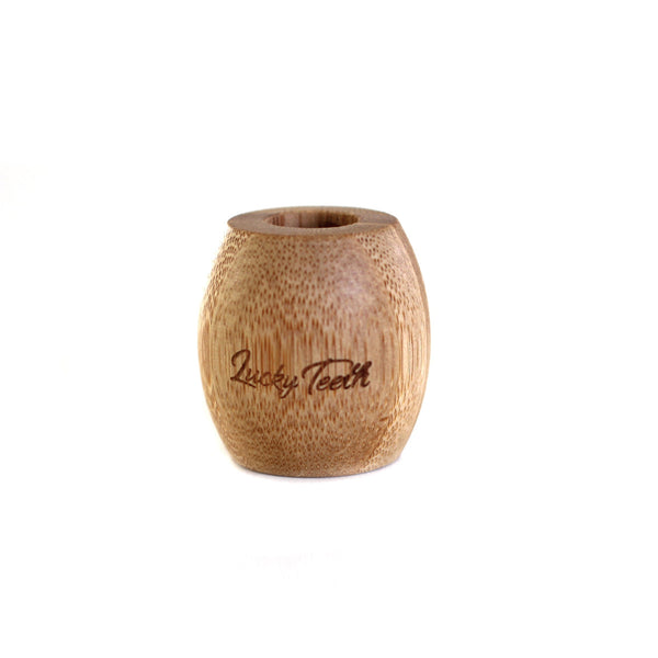Wooden container with 'Lucky Tooth' branding on a white background