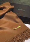Brown scarf with a visible brand logo on a dark background