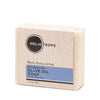 Bar of soap in a wooden box with Heliotrope branding on a white background