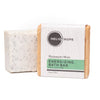 Two oversized 6oz natural exfoliating soap bars by Heliotrope SF with botanical ingredients