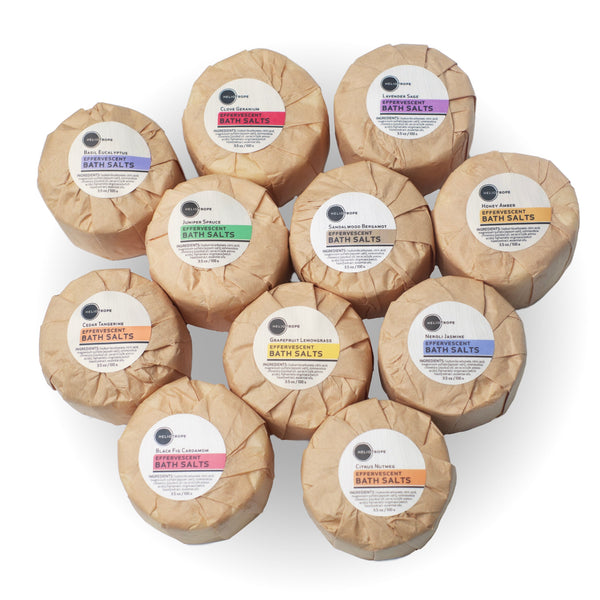 Collection of Heliotrope San Francisco bath fizzies in assorted essential oil blends