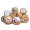 Heliotrope San Francisco natural bath fizzies with jojoba oil and silk proteins on a wooden surface