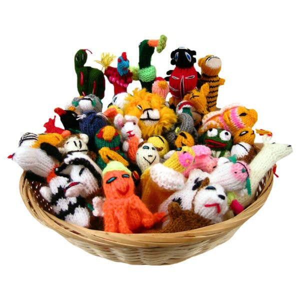 Basket filled with various colorful plush toys on a white background