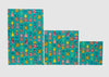 Set of three colorful towels with pineapple pattern on a light gray background