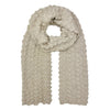 Beige knitted scarf on a white background