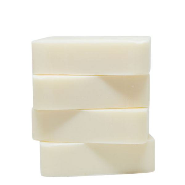 Three stacked bars of soap on a white background. 3-ingredient natural soap bar with coconut oil, shea butter & sunflower oil — dermatologist approved for eczema, psoriasis & sensitive skin. Safe for babies. Shop now.