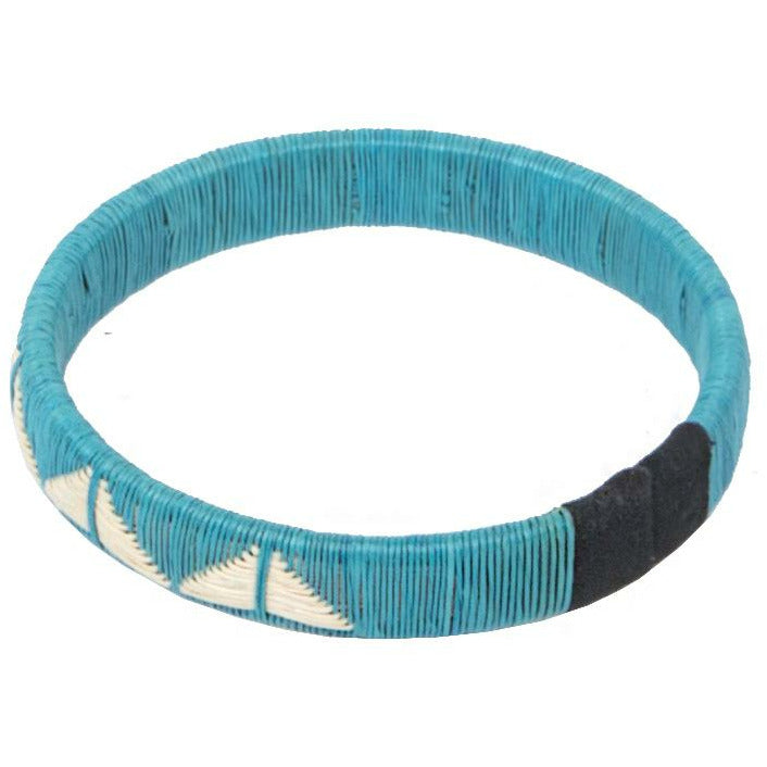 Blue woven palm butterfly bracelet with intricate handwoven design and sterling silver detail
