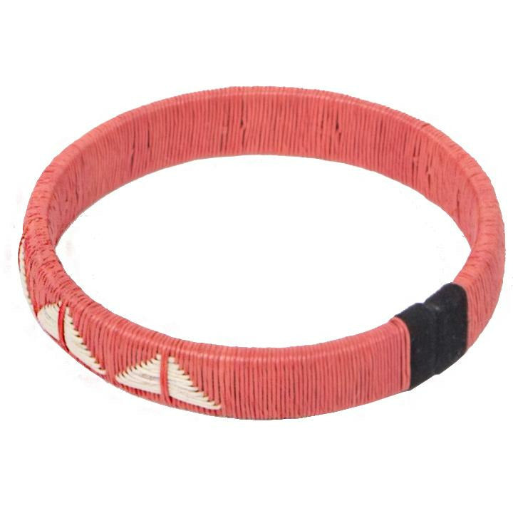 Coral woven palm butterfly bracelet handmade by Wounaan artisans using traditional weaving techniques