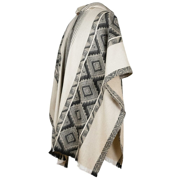 Woman wearing black grey diamonds alpaca poncho, front view, soft alpaca blend wrap