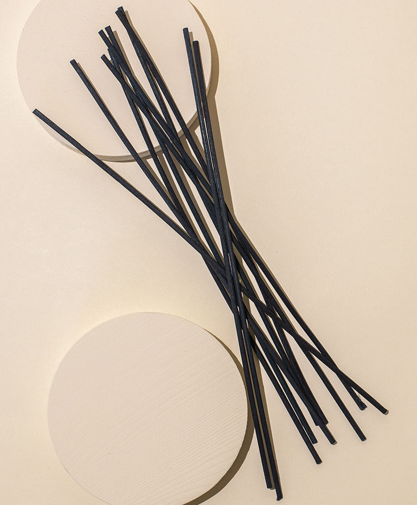 Close-up of black rattan diffuser reeds for reed diffuser bottles