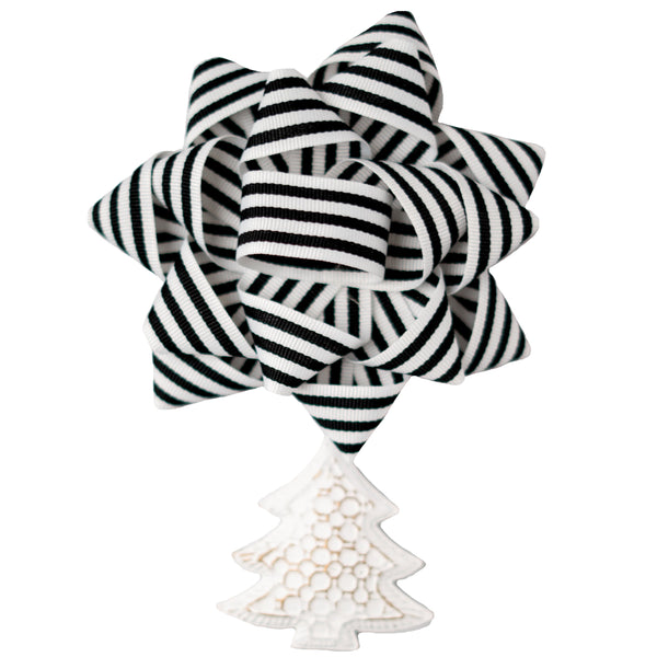 Black and white striped bow with a decorative box on a white background