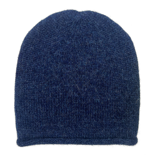 Blue knit beanie on a white background