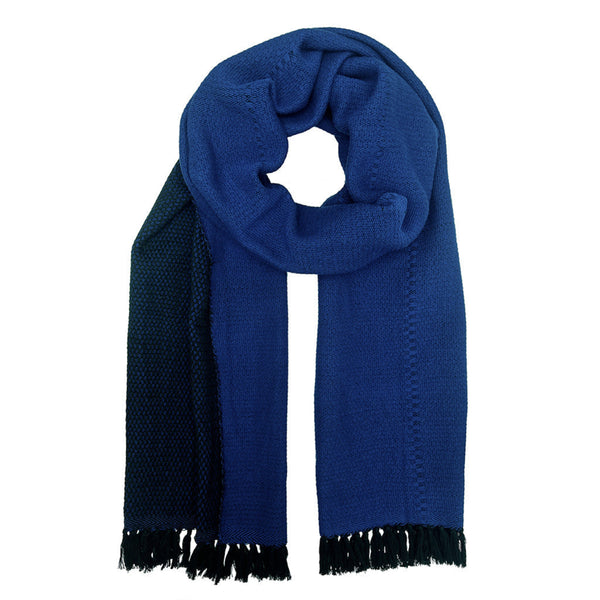 Blue scarf with black fringe on a white background