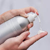 Plaine Products body lotion lifestyle shot — eco-friendly daily moisturiser in use