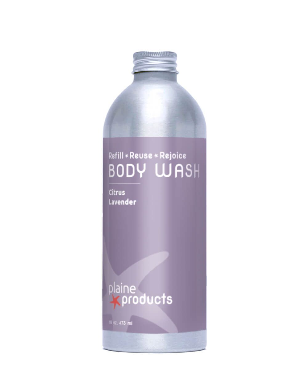 Body wash bottle with purple label on a white background