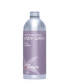 Body wash bottle with purple label on a white background