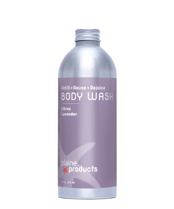 Body wash bottle with purple label on a white background