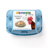 Closed miniature egg carton of Elseware Unplug realistic rubber bouncy eggs, top view