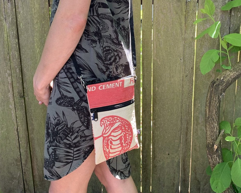 The Breezy Crossbody is the perfect eco-friendly bag for your everyday needs. Made from recycled materials and featuring a stylish design, this bag is both functional and sustainable. Carry your essentials in style and make a positive impact on the environment. Order yours today!