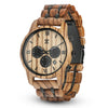 Wooden watch with black face and details on a white background