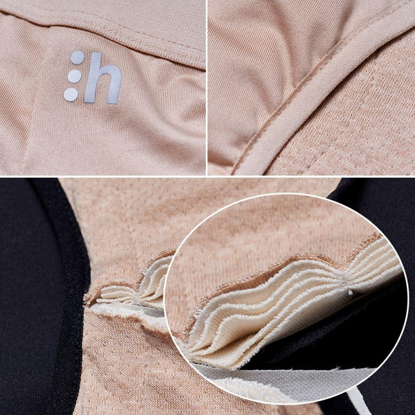 Close-up of beige fabric with a brand logo and stitching detail.