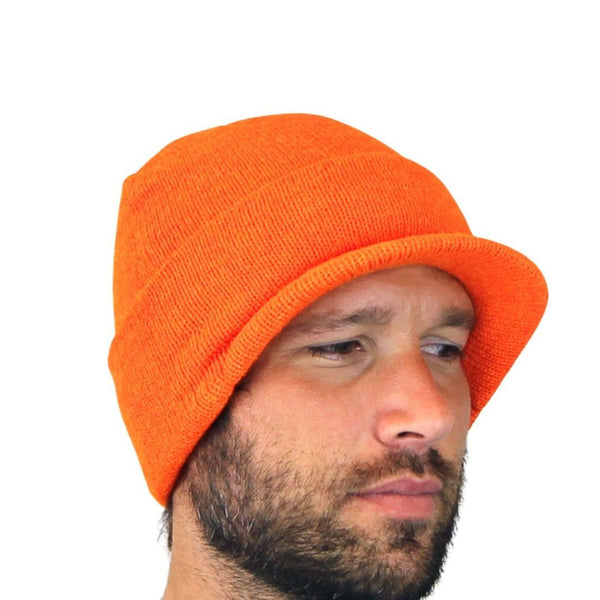 Man wearing an orange beanie on a white background