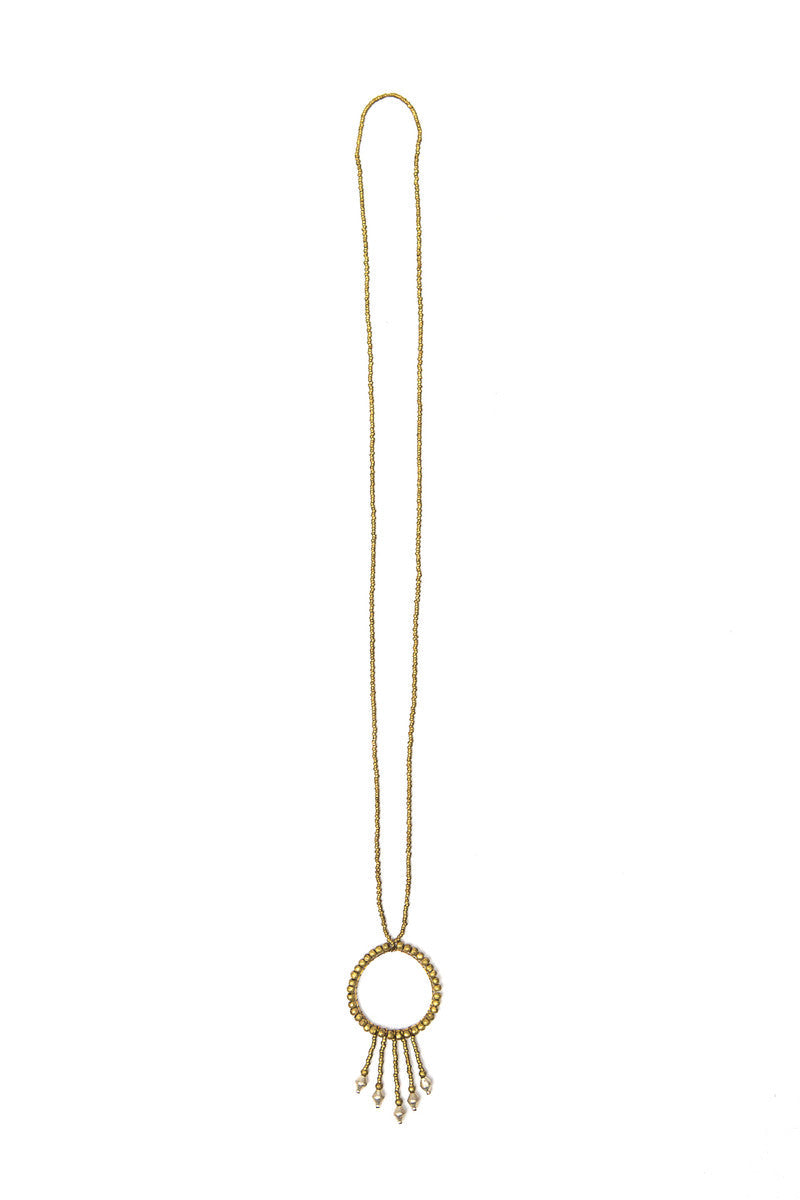 Long dangle recycled bullet casing brass necklace by Fair Anita — nickel-free and ethically made